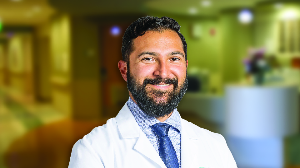 V Karlos Arcos, M.D.