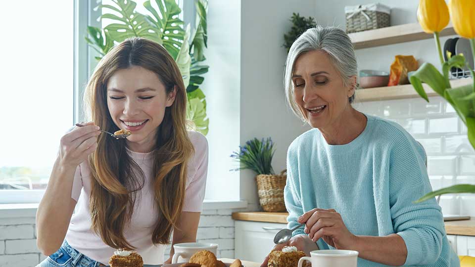 Two women eating breakfast