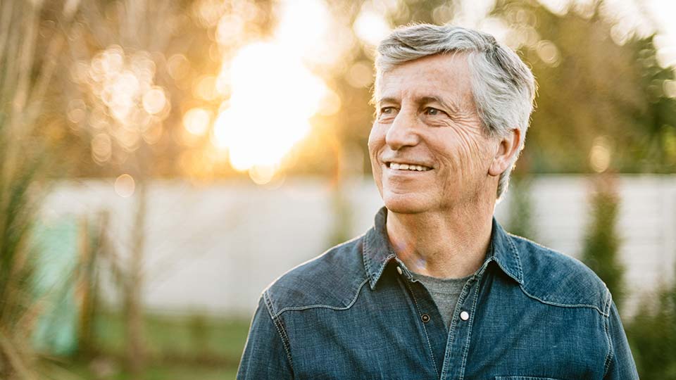 Man, outdoors, smiling