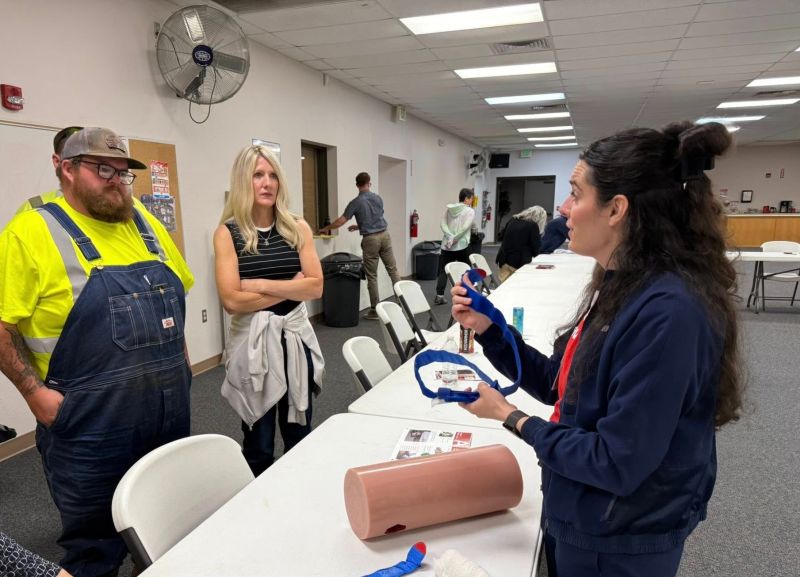 Caregiver talking to community members