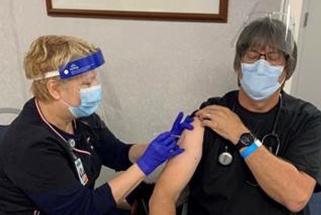 Joe receives vaccine