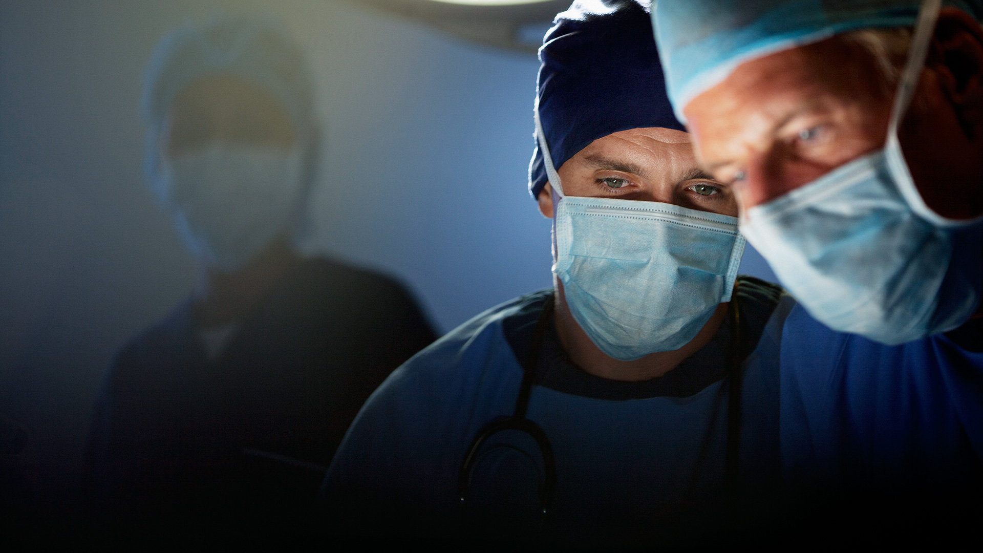 surgeons performing surgery