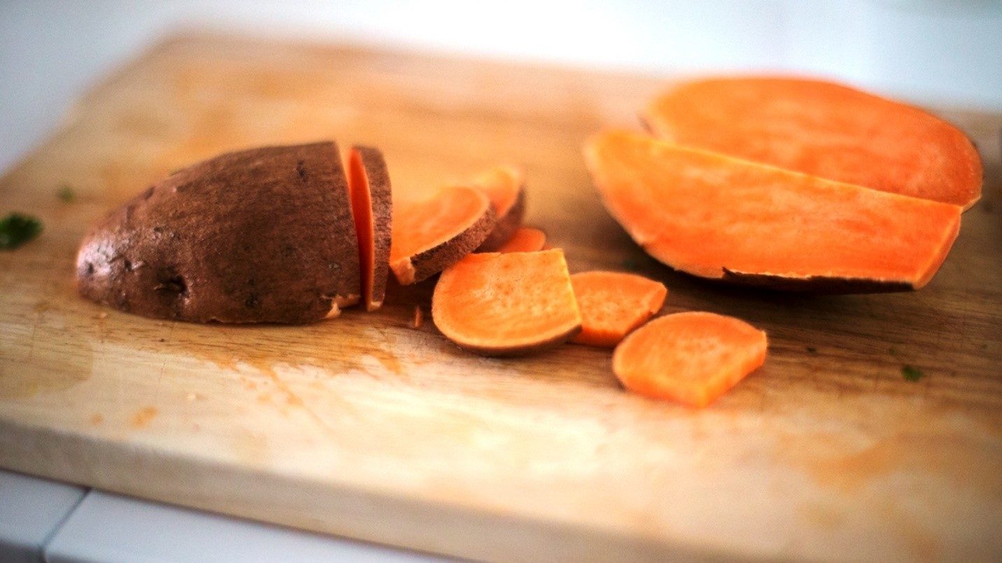 sweet potatoes on a cutting board