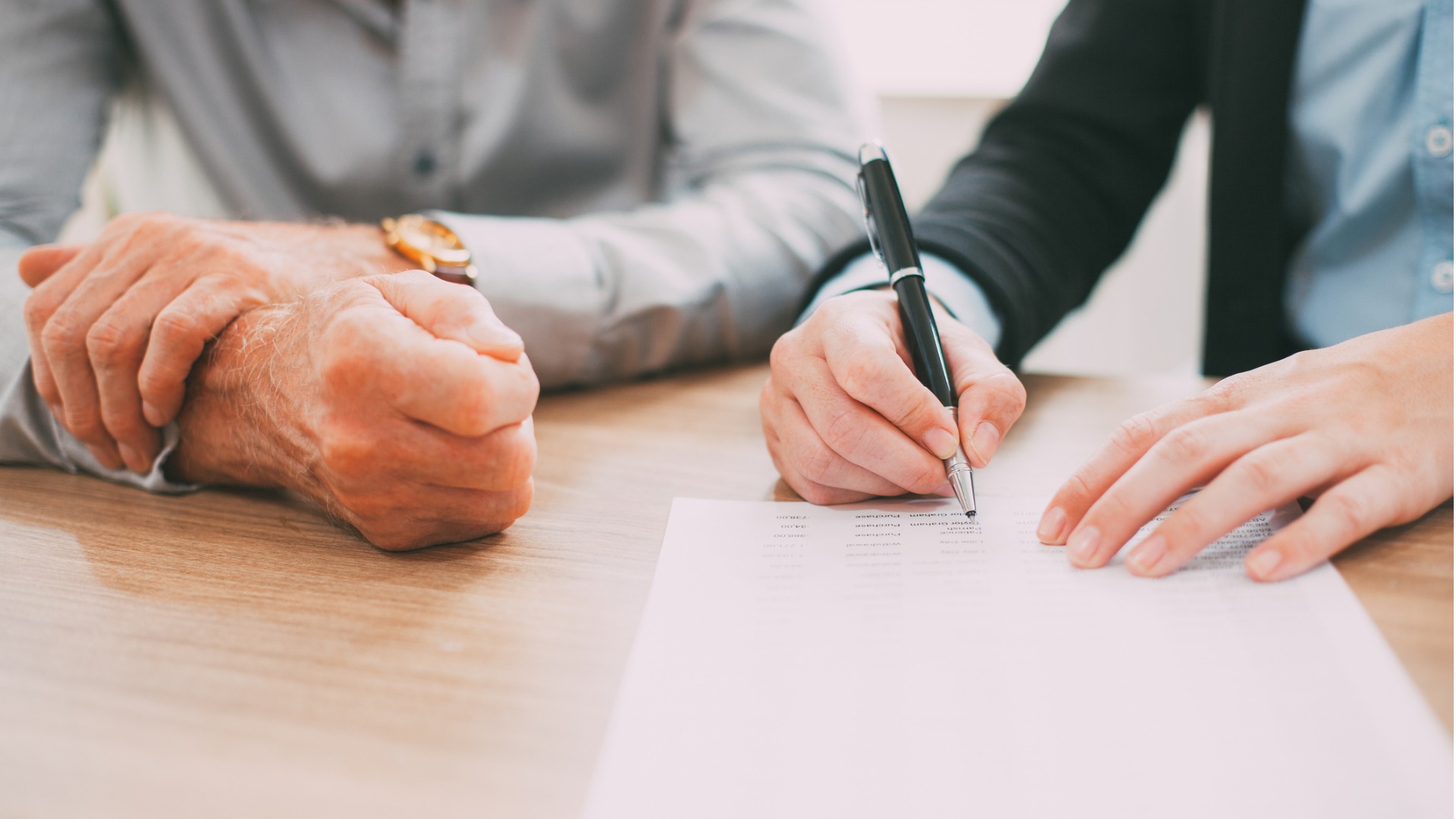 woman signing an advance directive