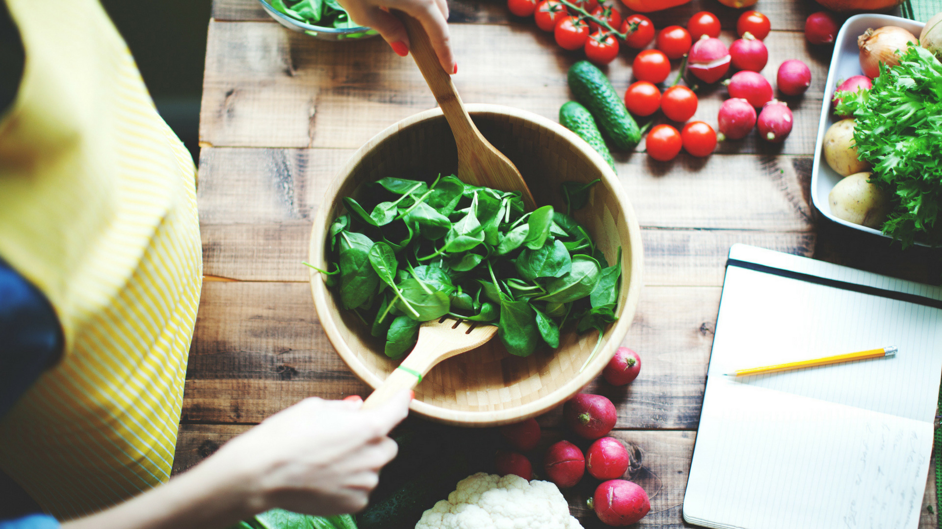 woman making a healthy salad