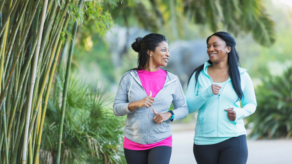 two women walking together