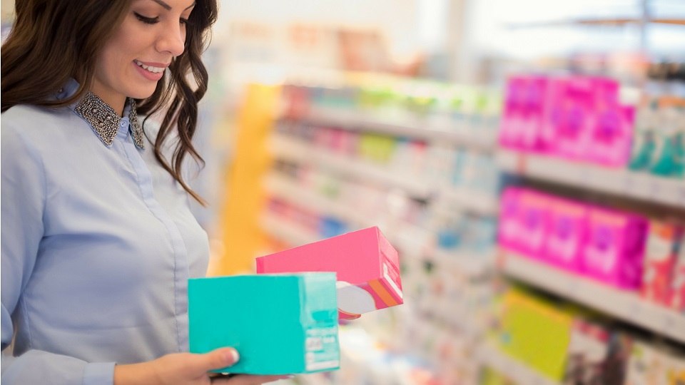 woman choosing tampons