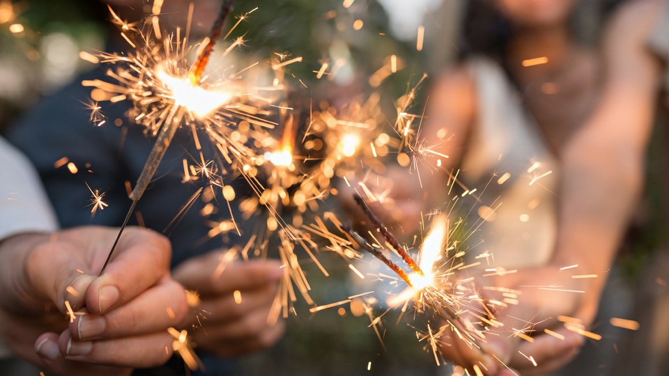 children playing with sparklers