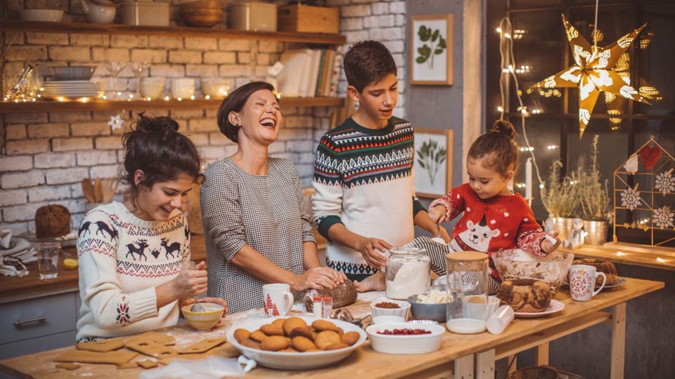 family baking holiday treats together