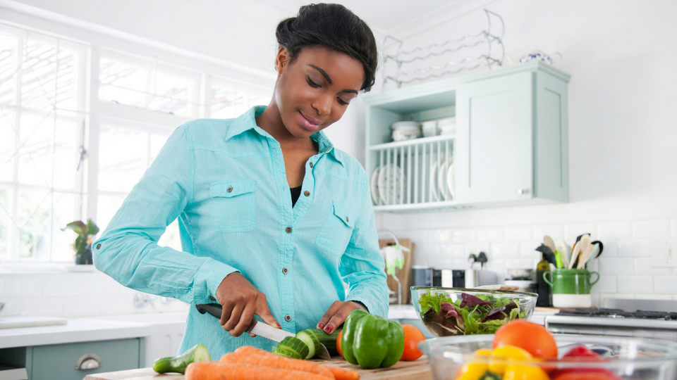 woman cutting vegetables