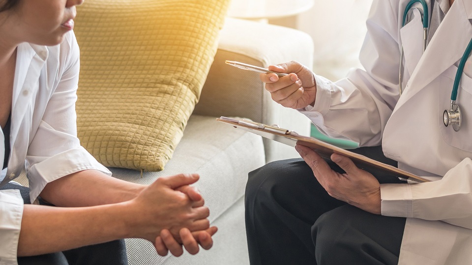 woman talking to her doctor