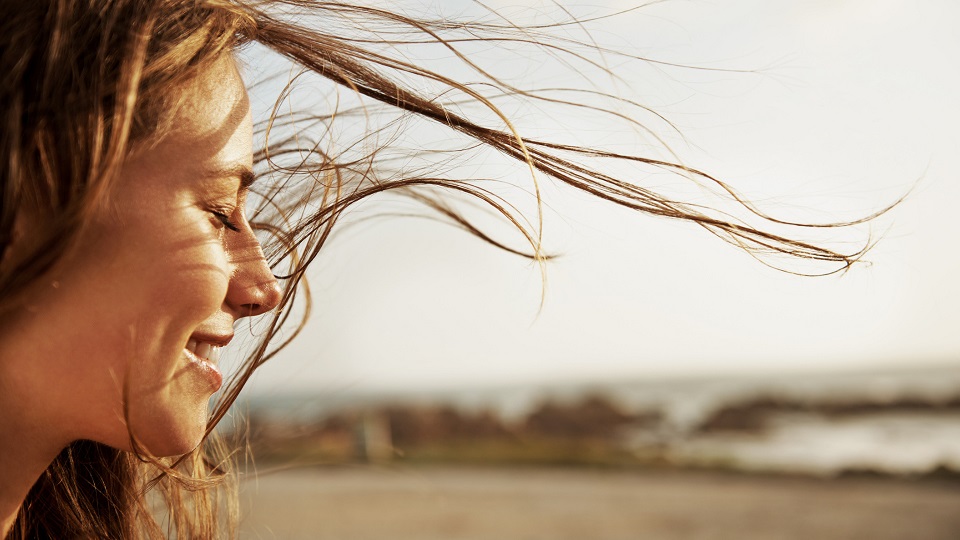 woman's hair blowing in wind