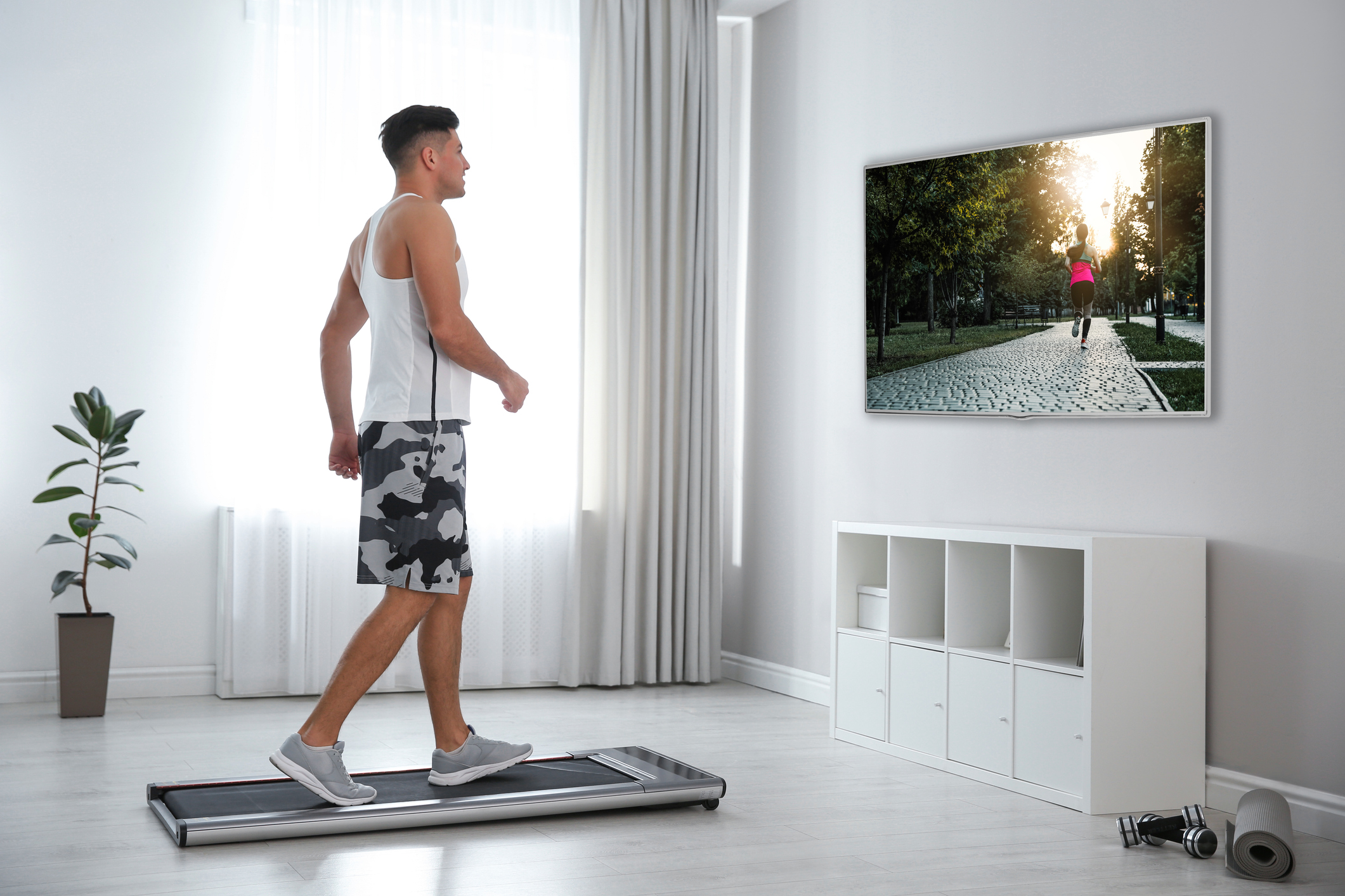 A man using a walking pad