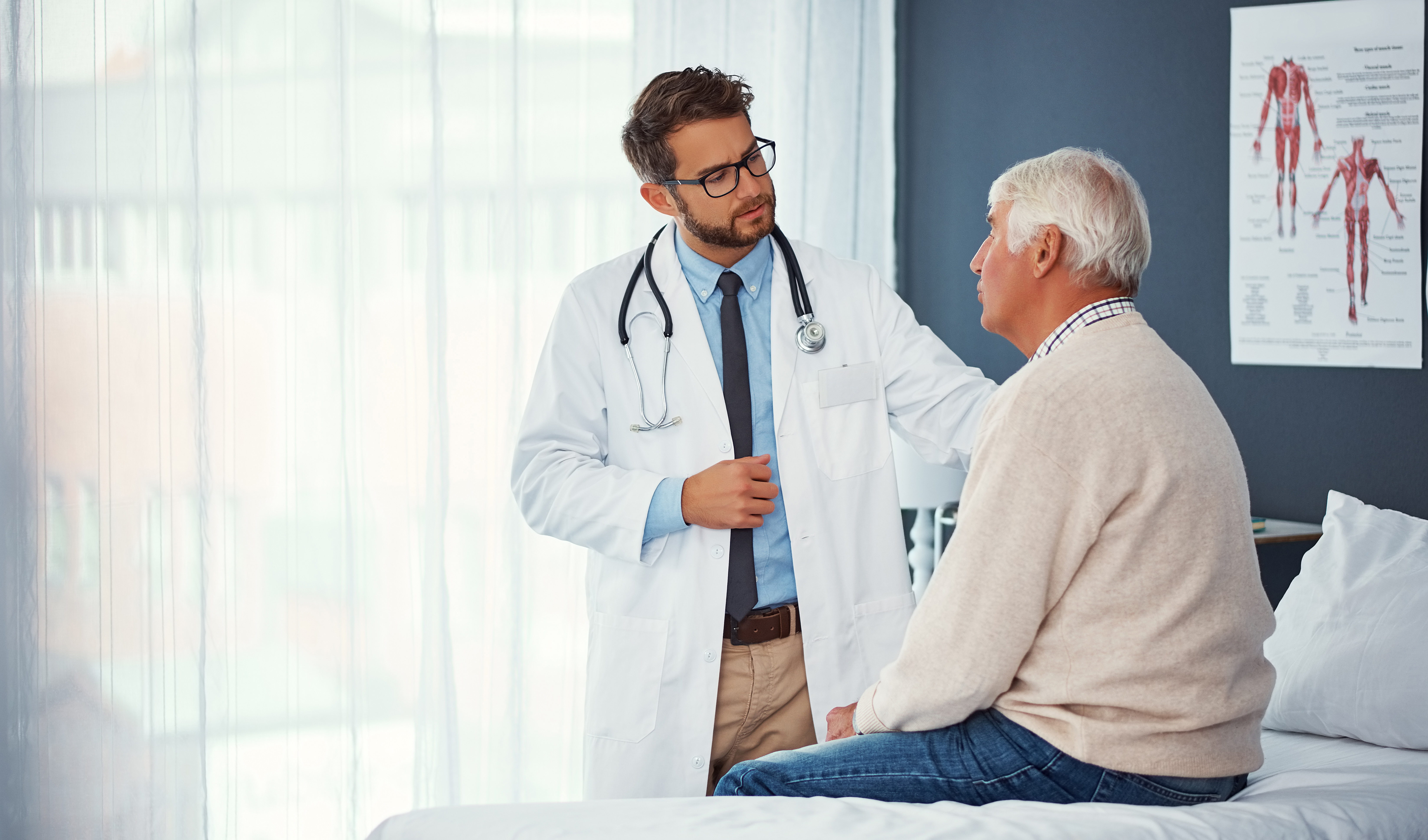 A doctor speaking with a patient