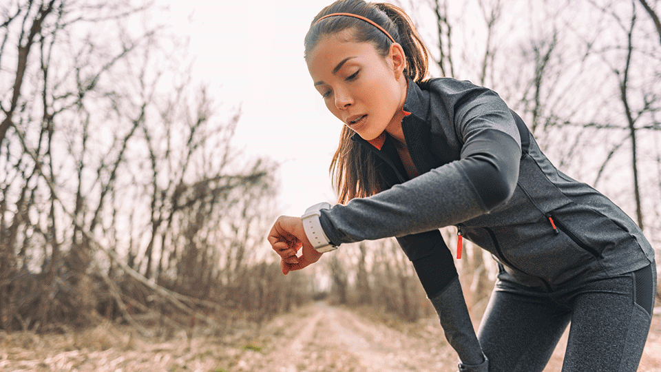 Runner checking her watch