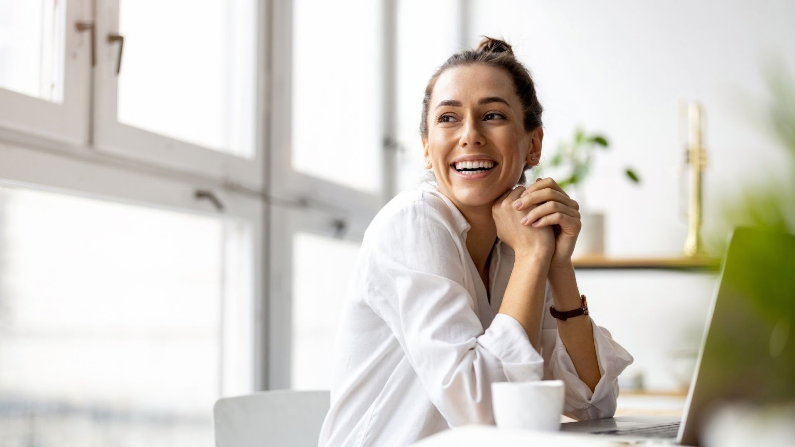 Woman thinking happy thoughts