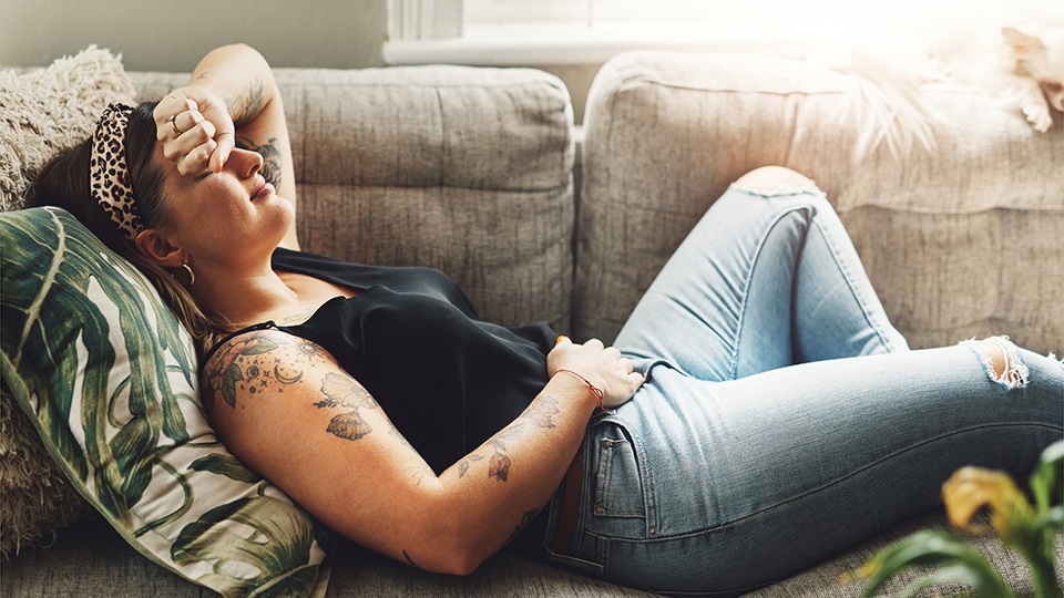 Woman experiencing stomach pain from stress