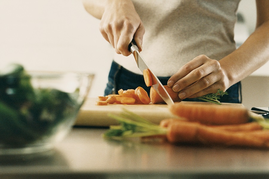 Food prep chopping carrots