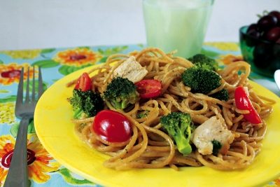 summertime spaghetti on yellow plate